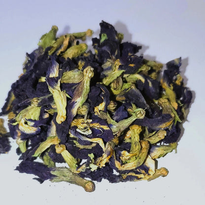 Dry butterfly pea flowers on a white background